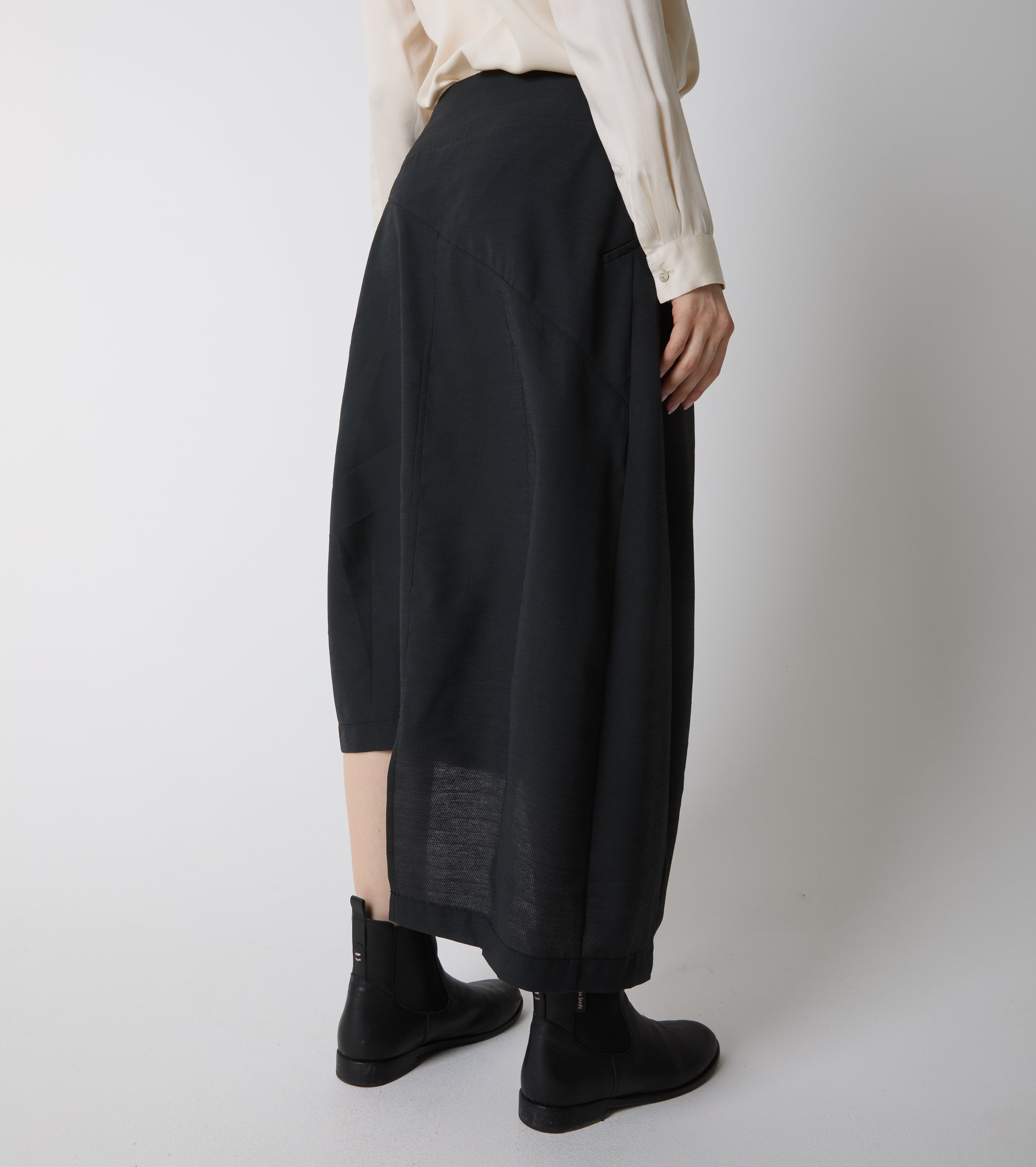 Long asymmetrical skirt with pleats