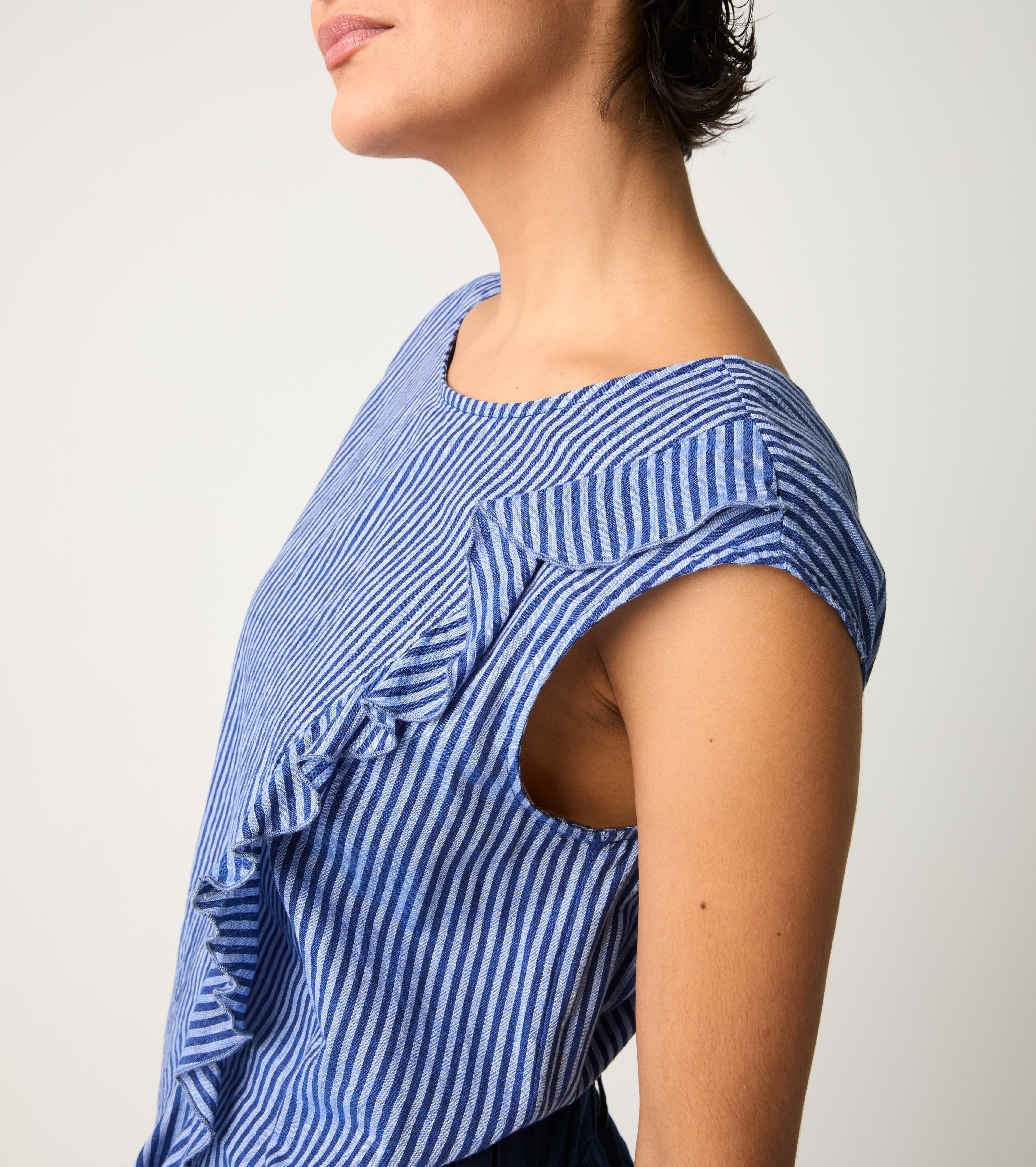 Tuta a righe con rouches azzurro