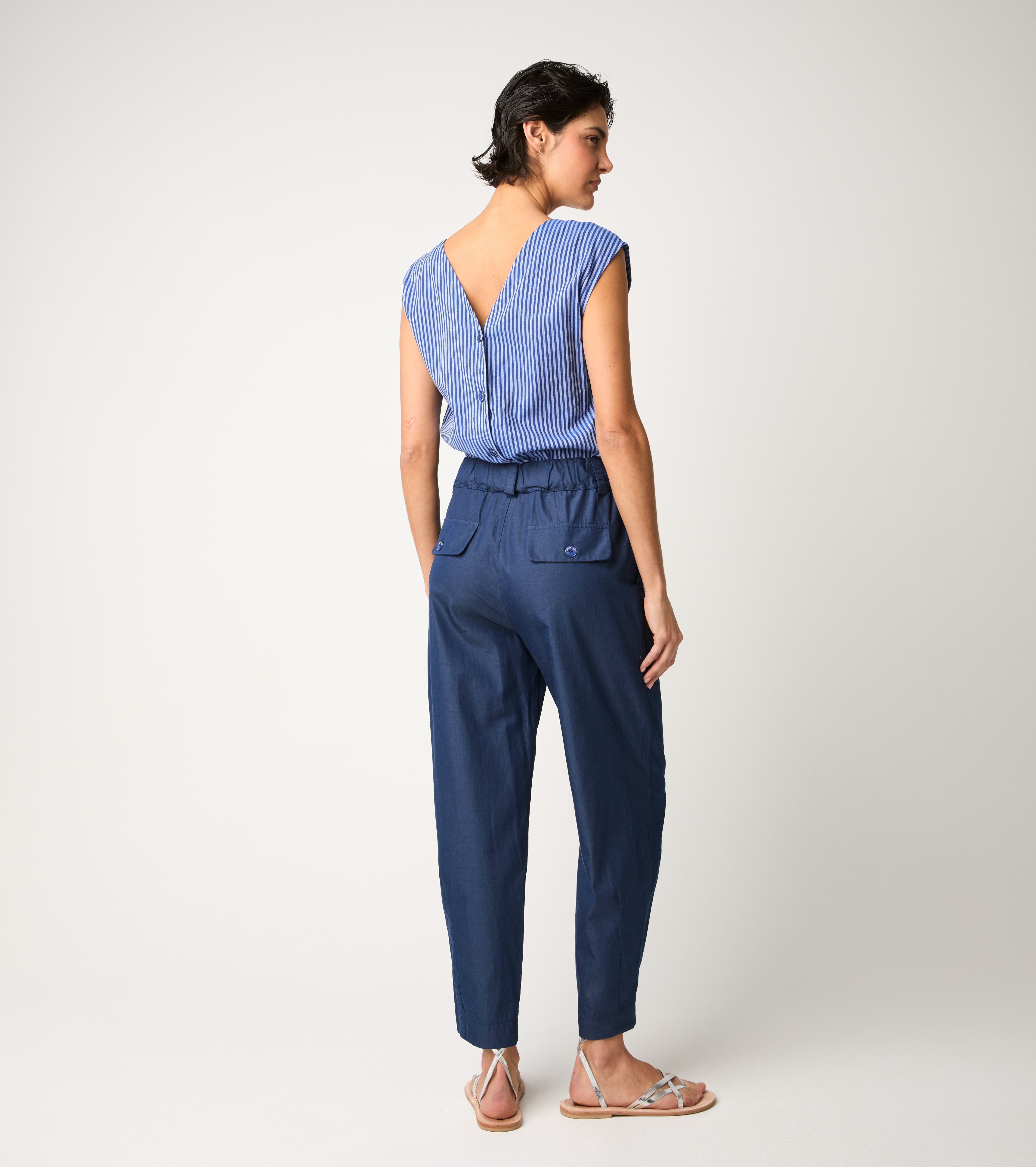Tuta a righe con rouches azzurro
