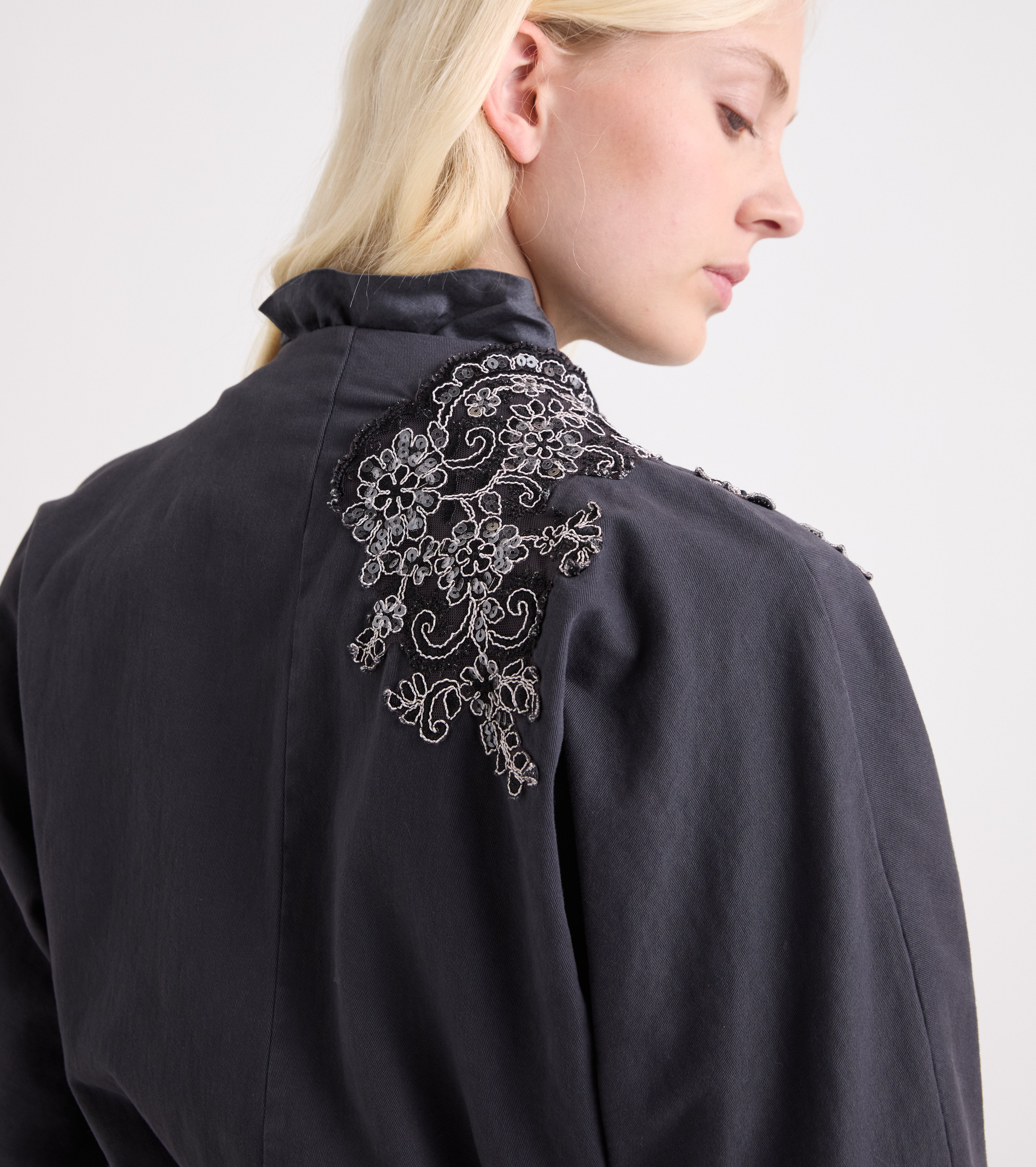 Jacket with ruffles and blackboard-coloured sequins