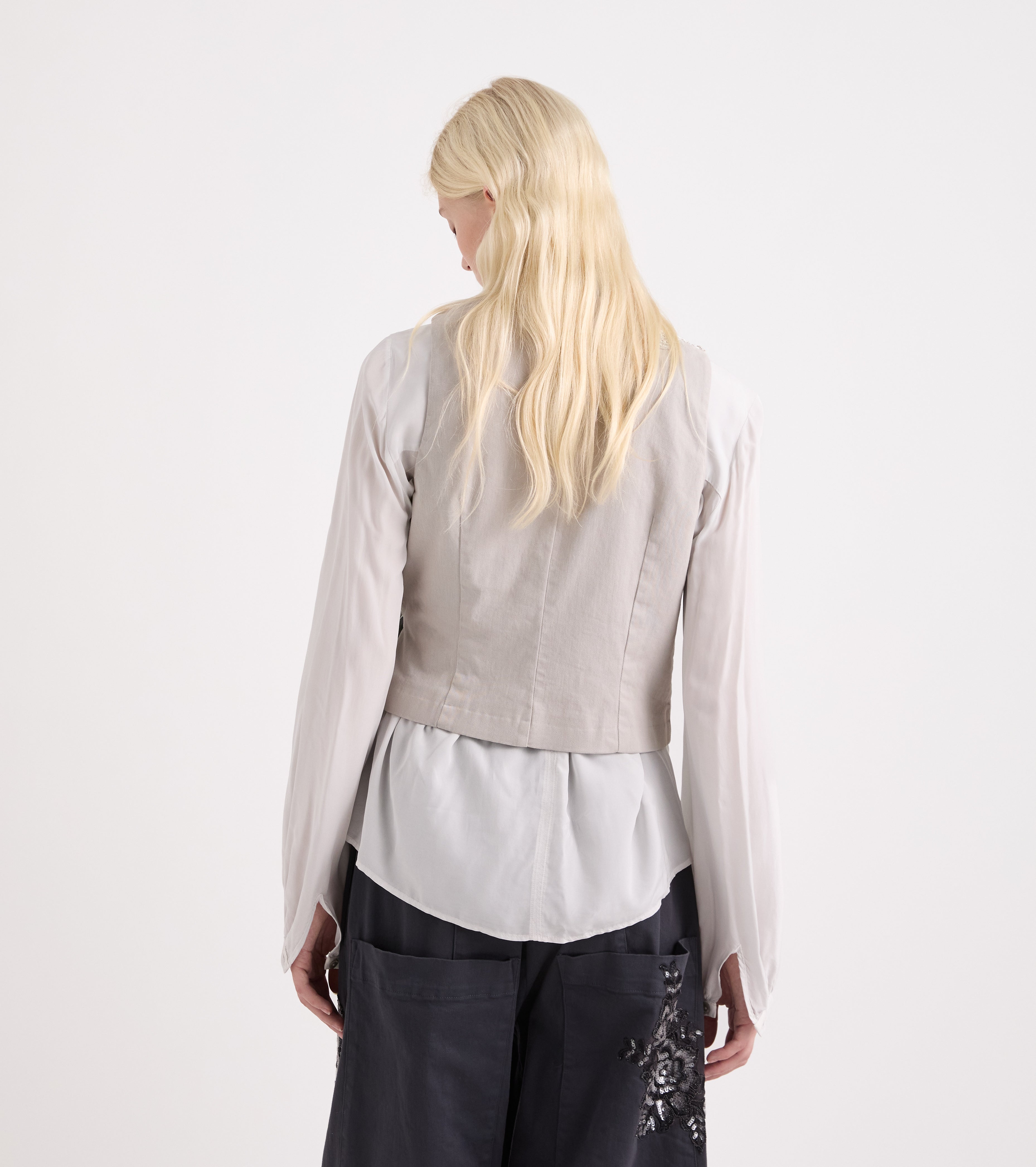 Gilet stretch con pizzo e rouches bianco e nero