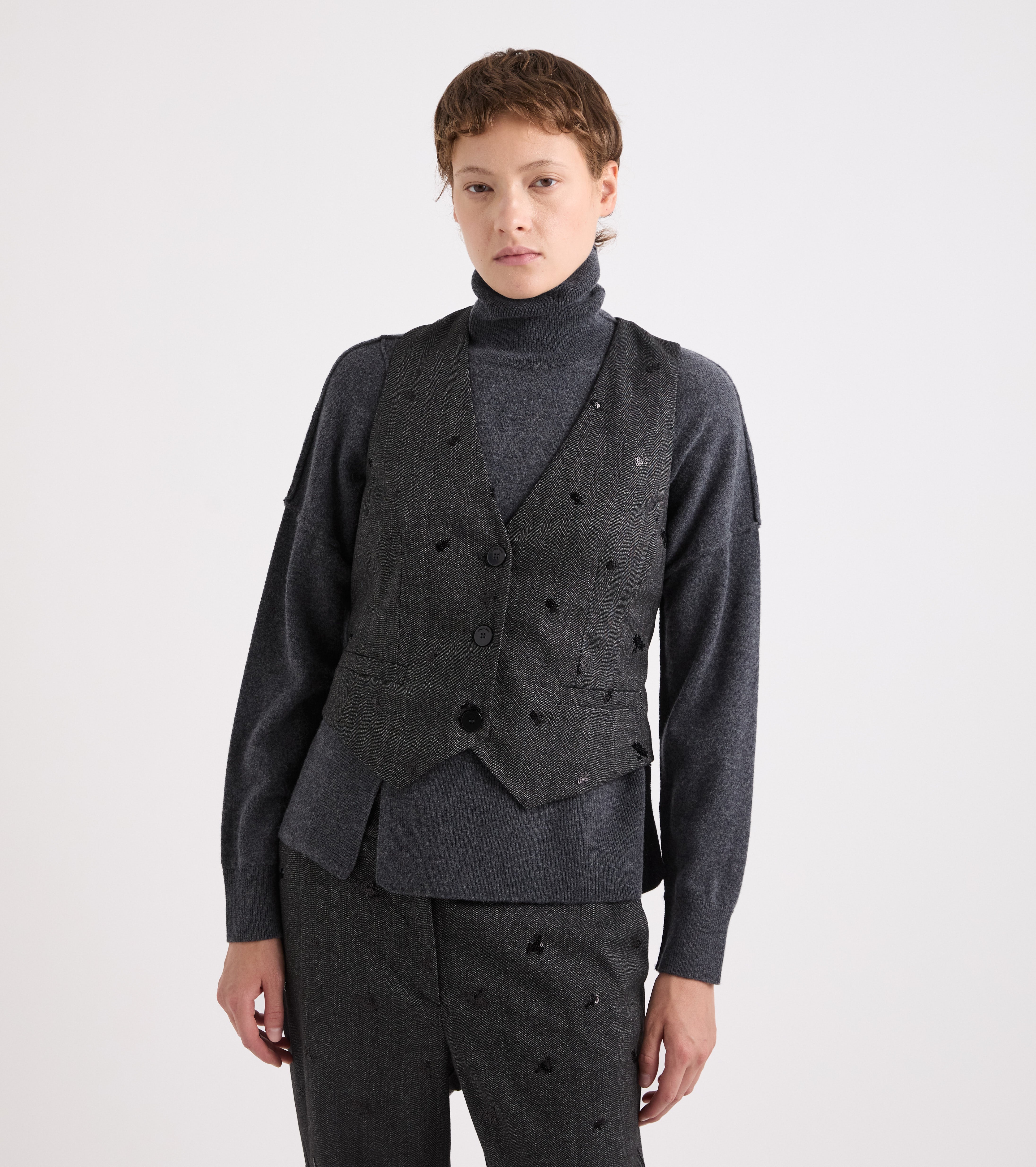 Gilet con scollo a V e ricami nero