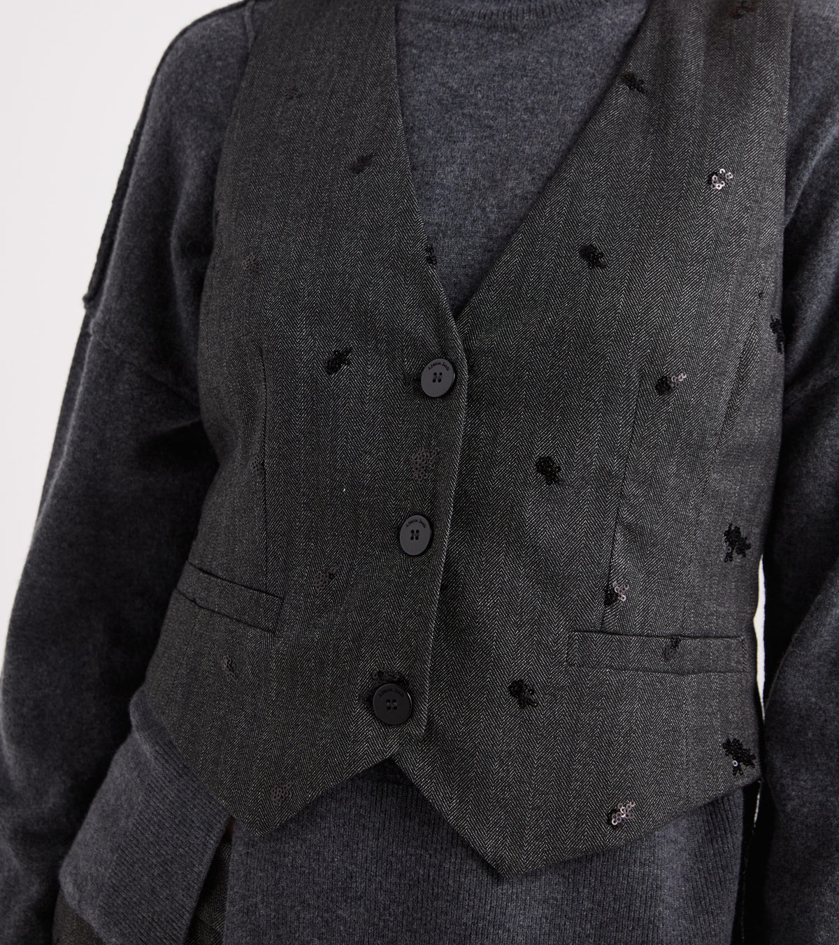 Gilet con scollo a V e ricami nero