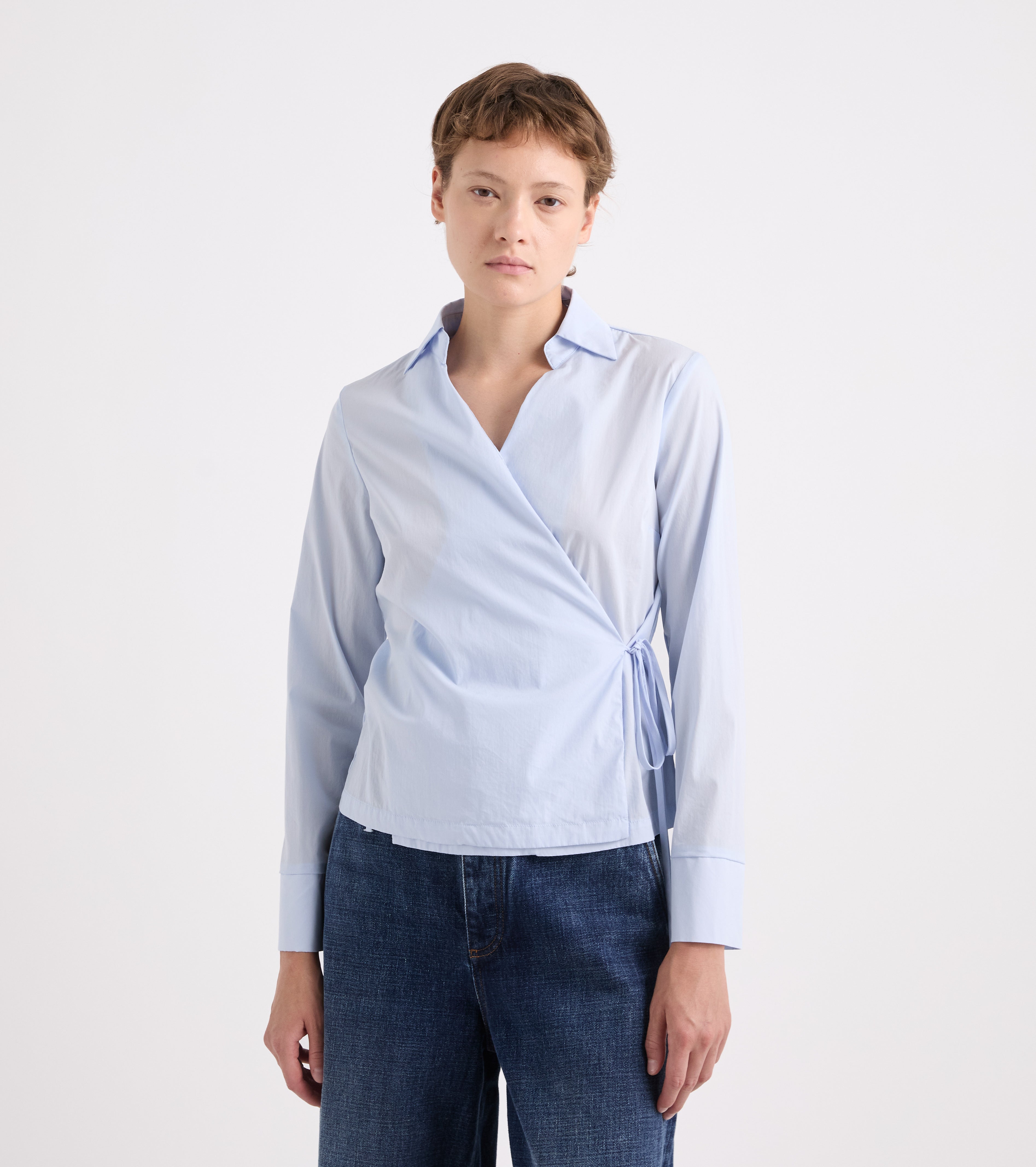 Blusa stretch con scollo a V