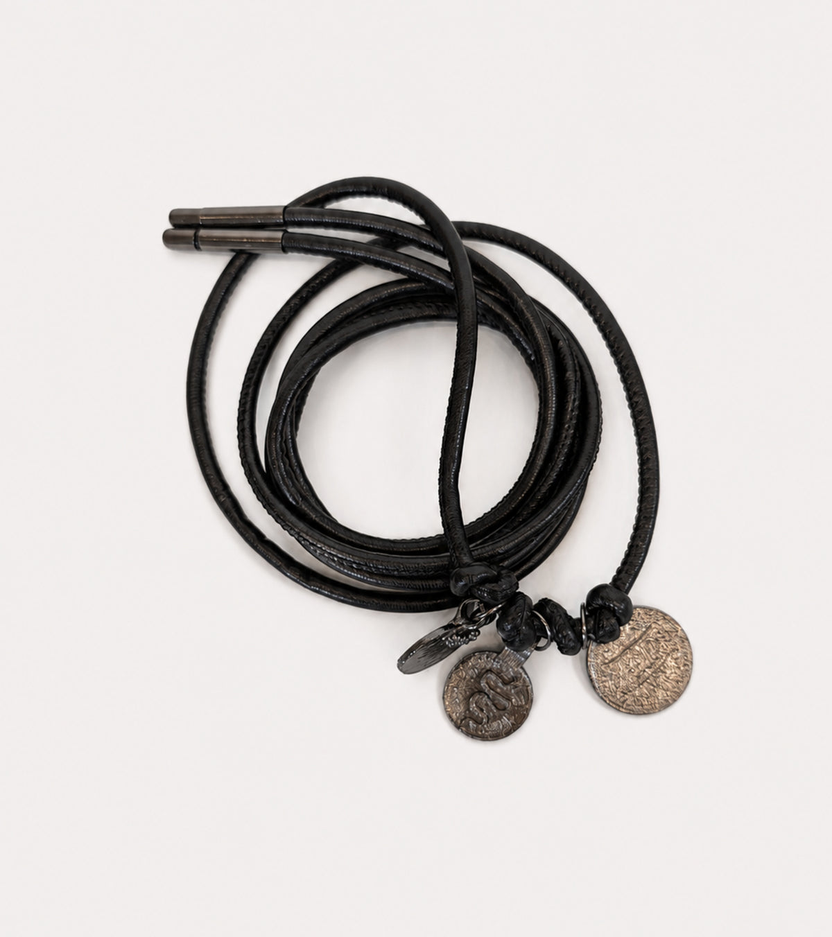 Faux leather belt with black diamond-shaped charms