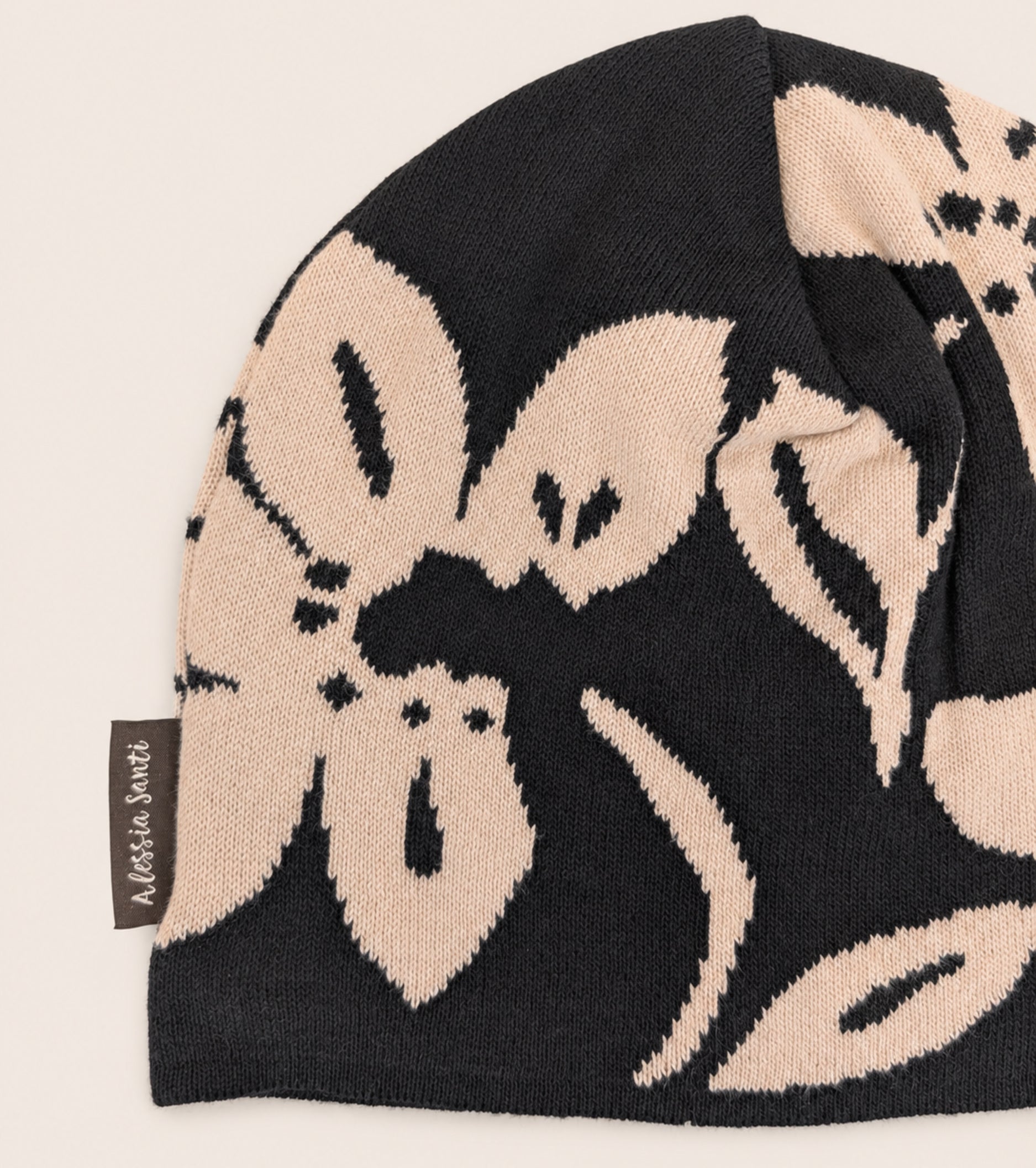Berretto beanie in maglia floreale nero beige